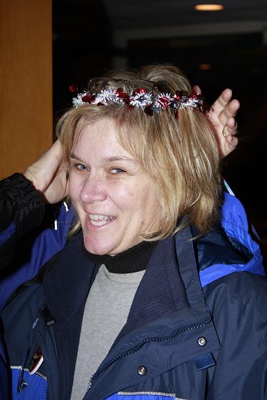 Winter Carnival Chair Kathy Bjerke gets crowned by Diggin's Darlings